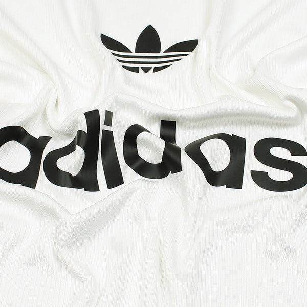 Pure white base with solid black contrast detailing.