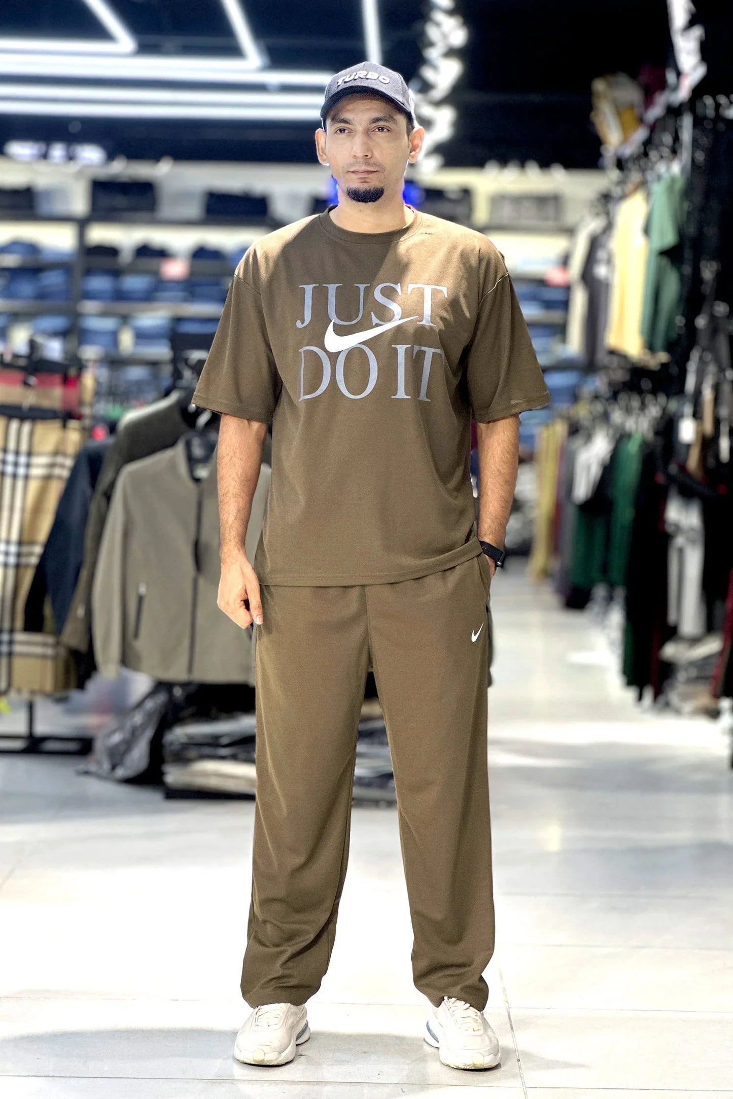 Previous Next  Skip to product information PreviousNext 50% off         Nke jst do it Signature Track Men's Tracksuit