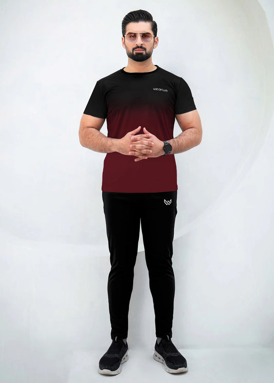 Top: A short-sleeved, crewneck t-shirt featuring a gradient (ombré) design that